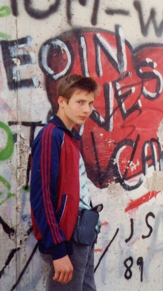 Bee Low the oldschool Graffiti writer is standing in summer 1989 next to the Berlin Wall at the Bernauer Straße in Wedding